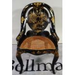A late Victorian ebonised and mother of pearl inlaid side chair with cane seat,