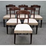 A set of eight late George III mahogany bar back dining chairs on tapering square supports,