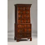 A small mid-18th century mahogany chest on chest, with two short over six long drawers,