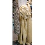Curtains; a pair of cream ground and beige foliate lined and interlined curtains,