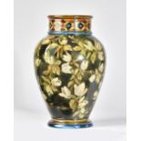 A Doulton faience vase, dated 1877,
