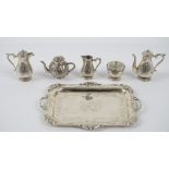 A miniature tea/coffee set, comprising; a shaped rectangular twin handled tray, a coffee pot,