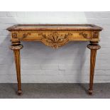 A Louis XVI style gilt framed console table with mirrored top over carved frieze on tapering fluted