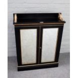 A Victorian parcel gilt ebonised chiffonier with pair of mirrored doors and grille sides,