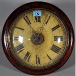 An early 20th century postman's wall clock with stained pine case, 30cm diameter.