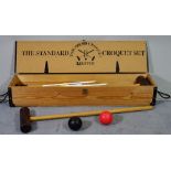 Townsend Croquet; a 20th century cased croquet set, 108cm wide x 17cm high.