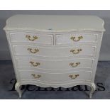 A Louis XV style grey and white painted bedroom suite comprising serpentine chest of two short and