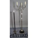 A Regency style silvered metal three light standard lamp on ebonised plinth base,