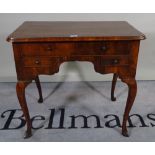 A 20th century red lacquer chinoiserie decorated folding games table, 75cm wide x 70cm wide.