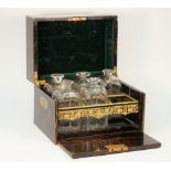 A 19th century brass inlaid coromandel decanter box,