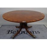 A George III coromandel banded mahogany centre table,