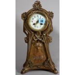 An Art Nouveau spelter mantel clock, 36cm.