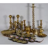 A quantity of mostly 19th century copper and brassware, including andirons, candlesticks,