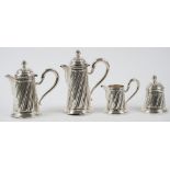 A group of Italian wares, comprising: a hot milk jug, a hot water jug and a milk jug,