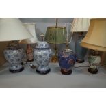 A group of seven 20th century table lamps,