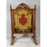 A Victorian mahogany framed fire screen 62cm wide x 100cm high and an Edwardian inlaid mahogany