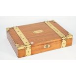 A brass bound hardwood rectangular jewellery box, with tray interior, 42cm wide x 8cm high.