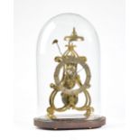 A late 19th century brass framed skeleton clock with single train movement,