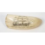 A mid-19th century scrimshaw whale tooth,