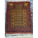 A Beluche prayer rug, the tan mehrab with rows of stylised flower heads, vases to each side,