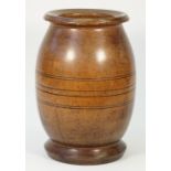 A large turned hardwood vase, with ribbed decoration, 39cm high.