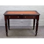A mid-19th century mahogany writing table, with pair of frieze drawers, on reeded supports,