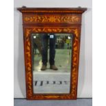 An Edwardian inlaid mahogany wall mirror with bevelled glass, 62cm wide x 95cm high.