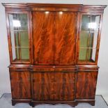 A Regency style mahogany breakfront display cabinet on bracket feet, 150cm wide x 172cm high.