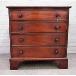 A small mahogany chest of four long graduated drawers, on bracket feet, elements 19th century,