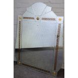 Versace; an arched topped mirror with etched and 'Greek key' decoration, 95cm wide x 123cm high.