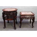 A 19th century Chinese carved hardwood circular two tier jardiniere stand with marble inset top,