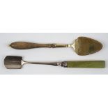 A George IV silver cheese scoop, with a green stained ivory handle,