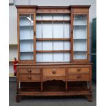 An 18th century and later oak dresser,