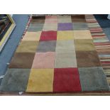 A machine made chequered carpet, 220cm x 160cm.