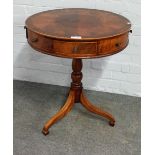 A George III style inlaid mahogany drum table,