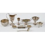 A group of silver comprising; a milk jug, Chester 1898, a Victorian bowl,