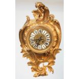 A French gilt Louis XV style gilt metal cartel clock, late 19th century,