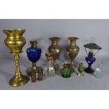 Collectables, including; five coloured glass oil lamps of various sizes, the largest 25cm,