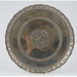 An Asian shaped circular salver, the centre decorated with four entwined birds,