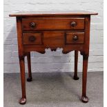 A mid-18th century fruitwood low boy, with three frieze drawers, on club supports,