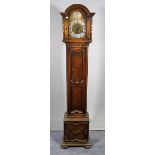 Tempus Fugit; a 20th century oak cased eight day longcase clock, 31cm wide x 180cm high.