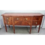 A George III inlaid mahogany sideboard, with five frieze drawers on spiral turned supports,