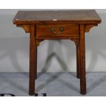 A late 19th century elm altar table with single frieze drawer on turned supports,