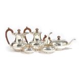A silver five piece tea and coffee set, comprising; a teapot, a hot water jug,