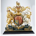 A Polychrome painted carved wooden British warrant or crest, late 19th/ early 20th century,