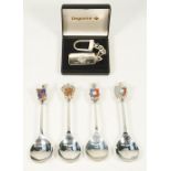 A part set of four silver and enamelled spoons,