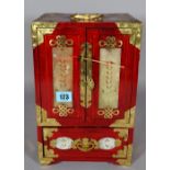 A 20th century Chinese hardwood gilt metal mounted and hardstone inlaid jewellery cabinet,