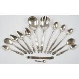 Fourteen pieces of Georg Jensen acorn pattern Sterling silver table flatware,