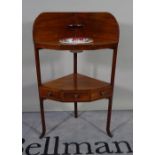 A George III mahogany corner wash stand with single drawer.