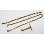 A 9ct gold uniform curb link watch Albert chain, fitted with a swivel,